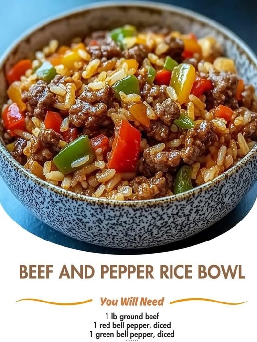 "Delicious beef and bell peppers stir-fried with rice, served in a bowl with fresh herbs and a savory sauce."