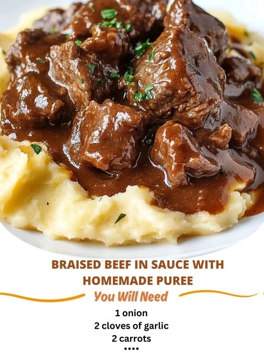 "Braised beef in savory sauce served with creamy homemade puree, garnished with fresh herbs and vegetables."