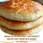"Freshly baked homemade bread, golden and soft, ready in 20 minutes, served with butter."