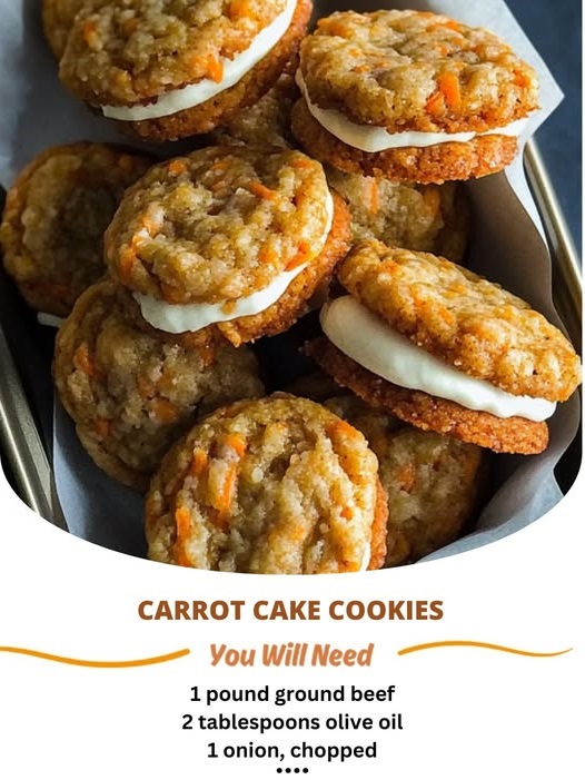 "Golden Brown Carrot Cake Cookies with a Soft, Moist Texture, Freshly Baked and Cooling on a Wire Rack, with Visible Shredded Carrots and Light Glaze Drizzled Over the Top."