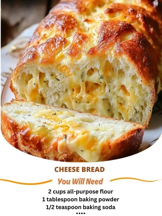 "Golden, freshly baked cheese bread with a crispy crust, oozing melted cheese from the center, sliced and served on a wooden board."