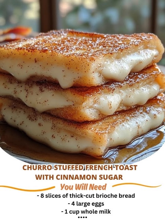 "Churro stuffed French toast with cinnamon sugar coating, golden brown toast, and a gooey filling."