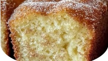 "Cinnamon Donut Bread – a soft, sweet bread filled with a cinnamon swirl and topped with a sugary cinnamon coating, making for the perfect morning treat."