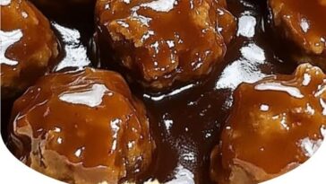 "Slow Cooker Salisbury Steak Meatballs: Tender beef meatballs in a savory brown gravy, cooked to perfection for a comforting, hearty meal."