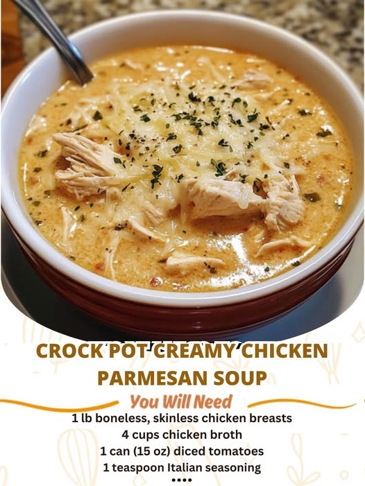 "Crock pot creamy chicken parmesan soup with a rich, creamy texture and topped with grated parmesan."