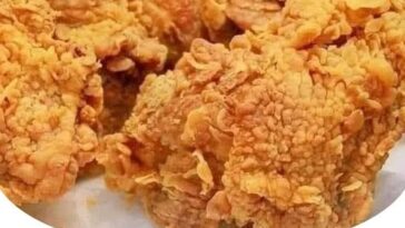 "Golden, crispy homemade fried chicken resembling KFC’s signature flavor, with a perfectly seasoned crust and juicy meat inside."
