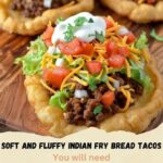 "Indian fry bread tacos with a soft, fluffy fry bread shell filled with seasoned meat, lettuce, and toppings."