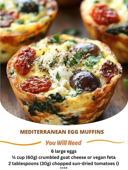 Savory Mediterranean egg muffins filled with sun-dried tomatoes, Kalamata olives, and fresh herbs, baked to golden perfection. Each muffin is topped with a sprinkle of feta cheese for added flavor.