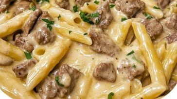 One-pot creamy beef and garlic butter pasta with tender beef, pasta, and a rich creamy sauce."