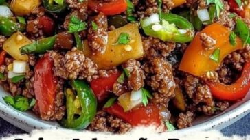 "Spicy jalapeño popper Mediterranean ground beef stir fry with vibrant vegetables and melted cheese."