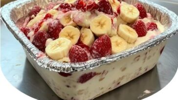 "Delicious strawberry banana pudding with layers of creamy pudding, fresh strawberries, and bananas"