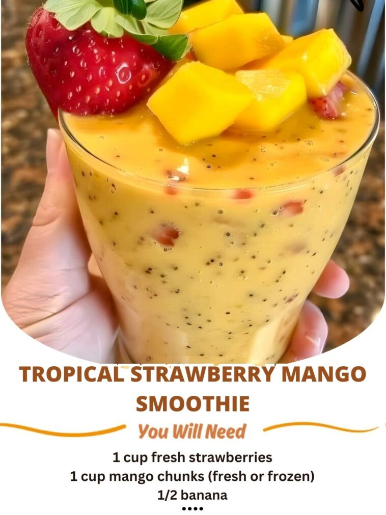 "Tropical Strawberry Mango Smoothie: A vibrant, refreshing blend of fresh strawberries and mangoes, topped with a hint of coconut for a fruity, tropical treat."