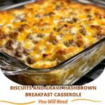 A hearty serving of Biscuits and Gravy Hashbrown Breakfast Casserole with golden hashbrowns, creamy sausage gravy, and fluffy biscuit layers, topped with melted cheese.