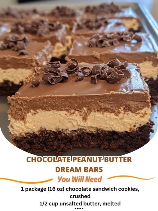 A plate of Chocolate Peanut Butter Dream Bars with a layered crust of chocolate, peanut butter, and creamy filling, topped with a smooth layer of chocolate ganache.