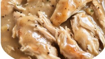 Hearty Crockpot chicken and gravy with tender chicken breasts served in a rich, creamy gravy.