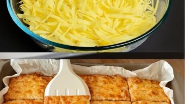 Golden-baked rustic potato slices topped with herbs and cheese, served in a rustic dish.