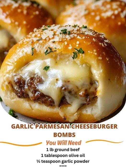 Garlic Parmesan Cheeseburger Bombs, golden and crispy on the outside with melted cheese and seasoned beef inside, garnished with fresh garlic and Parmesan.