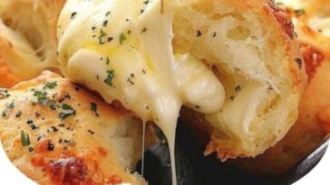 Gooey Mozzarella Biscuit Bombs – Melt-in-Your-Mouth Biscuits Stuffed with Gooey Mozzarella Cheese