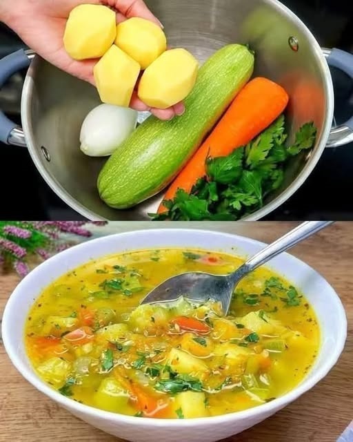 Healthy healing vegetable soup with carrots, zucchini, spinach, and sweet potato, garnished with fresh herbs.