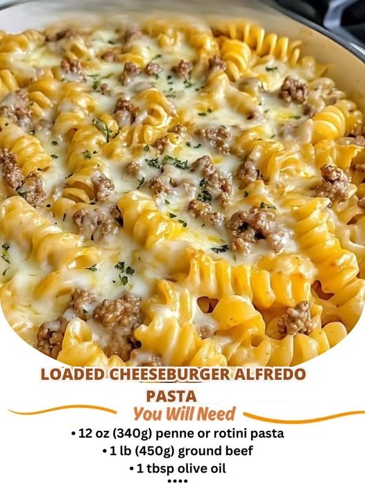 Loaded Cheeseburger Alfredo Pasta with creamy Alfredo sauce, seasoned beef, cheddar cheese, and fresh toppings in a hearty, satisfying dish