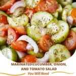A fresh bowl of marinated cucumber, onion, and tomato salad, featuring vibrant, sliced vegetables soaked in a tangy vinaigrette, garnished with fresh herbs.
