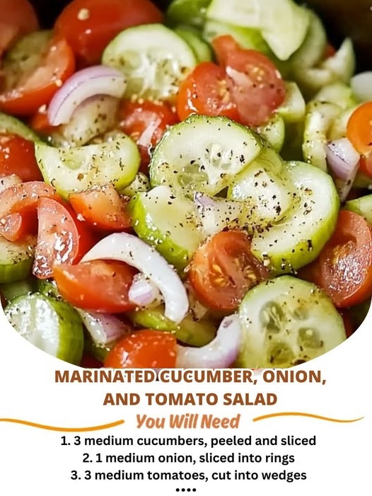 A fresh bowl of marinated cucumber, onion, and tomato salad, featuring vibrant, sliced vegetables soaked in a tangy vinaigrette, garnished with fresh herbs.