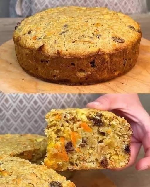 A slice of golden-brown apple, carrot, and oat breakfast bake topped with a sprinkle of cinnamon, resting on a plate next to a fork.