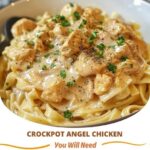 A plate of Crockpot Angel Chicken featuring tender chicken pieces in a creamy, savory sauce with a hint of seasoning.