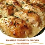 plate of tender, juicy chicken thighs served with a flavorful, savory sauce, garnished with herbs.
