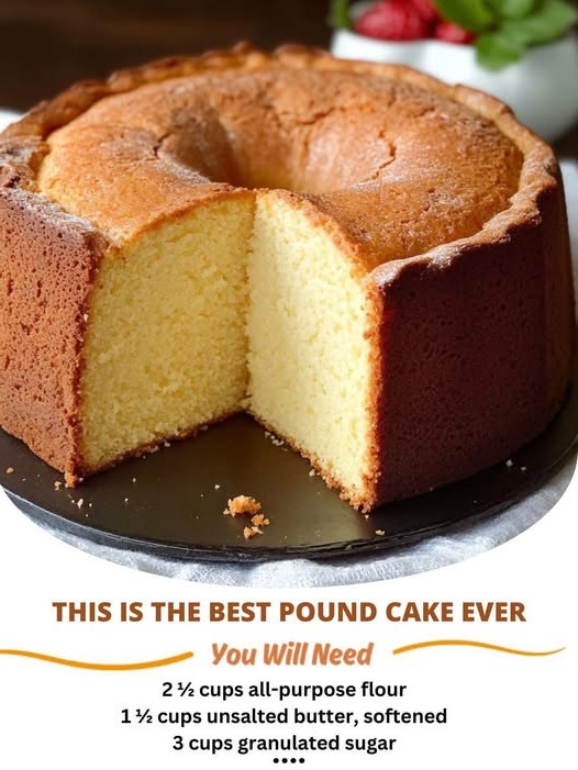 golden-brown slice of homemade pound cake on a white plate, showing a moist, dense texture and buttery crumb.