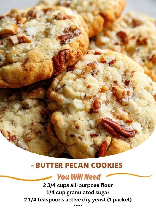 Golden-brown butter pecan cookies with toasted pecans, stacked on a plate and ready to enjoy.