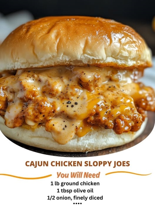 Cajun chicken sloppy joes with a spicy, flavorful chicken mixture piled on toasted buns, garnished with fresh cilantro, and served on a plate.