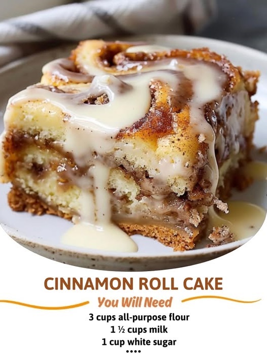 A slice of cinnamon roll cake with swirls of cinnamon filling and a drizzle of icing on top, served on a plate.