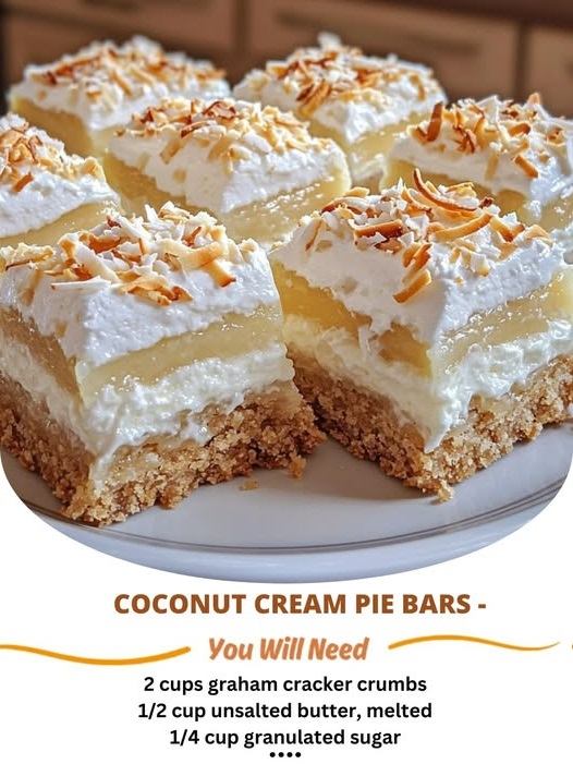 Delicious coconut cream pie bars with a creamy coconut filling, topped with toasted coconut flakes and a buttery crust.