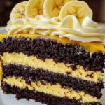 Double Chocolate Banana Layer Cake with rich chocolate frosting and sliced bananas between layers