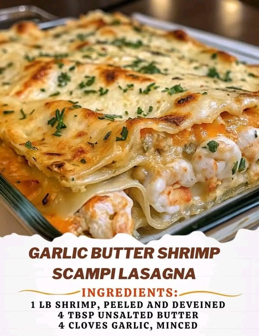 delicious serving of garlic butter shrimp scampi lasagna, featuring layers of lasagna noodles, succulent shrimp, creamy garlic butter sauce, and a sprinkle of parmesan cheese.