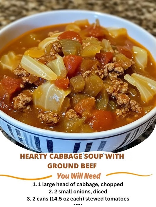 A bowl of hearty cabbage soup with ground beef, vegetables, and a tomato-based broth.