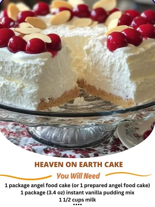 A slice of Heaven on Earth Cake with layers of fluffy cake, whipped cream, and fruit, topped with a light dusting of sugar.