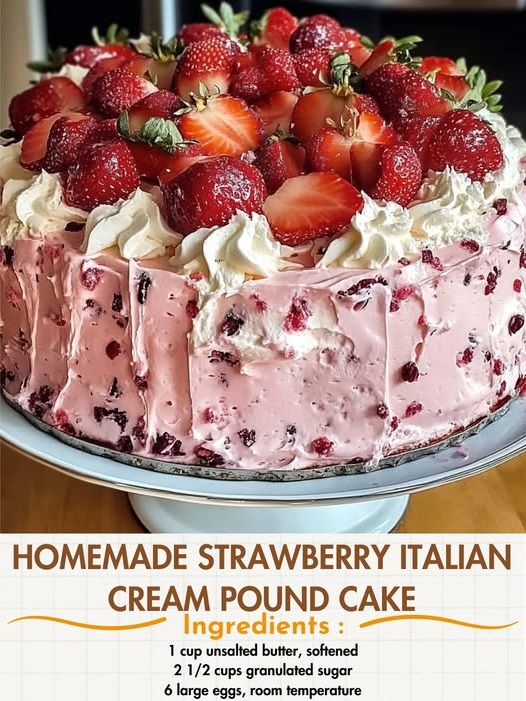 A slice of strawberry Italian cream pound cake topped with fresh strawberries and whipped cream on a white plate.