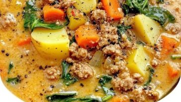 Delicious Italian sausage potato soup with carrots, spinach, and a rich, flavorful broth. Hearty and nutritious comfort food for any season.