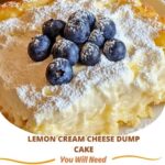 A slice of lemon cream cheese dump cake with a golden, crumbly topping and creamy lemon filling, served on a white plate.