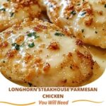Juicy grilled chicken breast topped with a golden, cheesy parmesan crust, garnished with fresh herbs and served with a side of vegetables.
