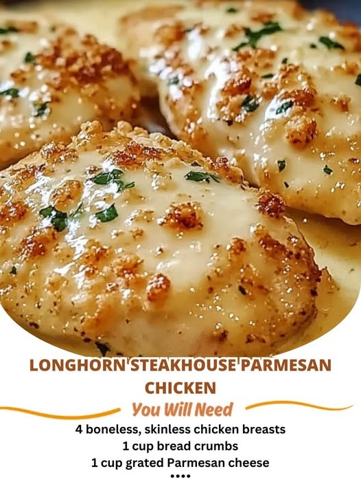 Juicy grilled chicken breast topped with a golden, cheesy parmesan crust, garnished with fresh herbs and served with a side of vegetables.