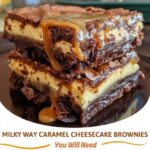 Rich brownies topped with gooey caramel and chunks of Milky Way candy bars, served on a white plate.
