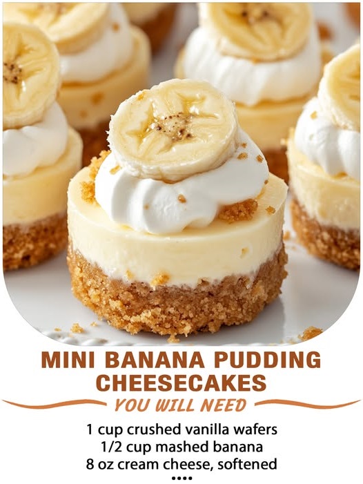 Mini banana pudding cheesecakes topped with whipped cream and banana slices, served in individual portions on a dessert tray.