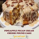A moist pineapple pecan cream cheese pound cake, topped with a glaze and garnished with chopped pecans.