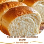 Freshly baked homemade bread loaf with a golden crust, sliced to reveal a soft, fluffy interior.