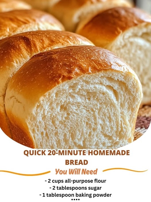 Freshly baked homemade bread loaf with a golden crust, sliced to reveal a soft, fluffy interior.