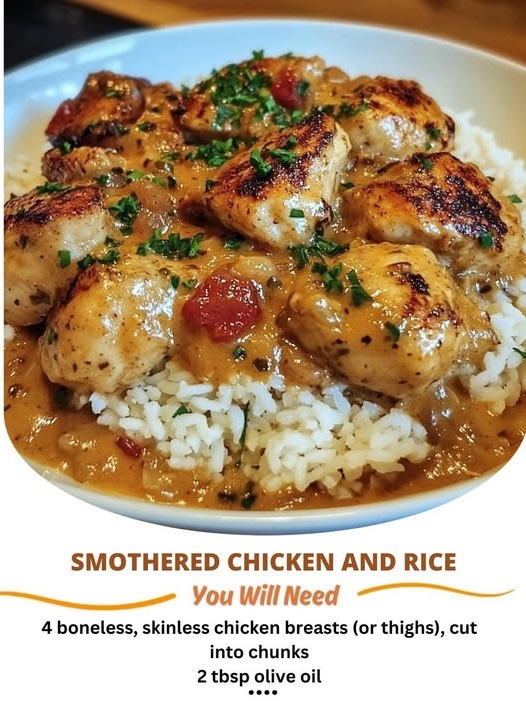 Smothered chicken breast served over a bed of seasoned rice, topped with creamy gravy and garnished with chopped herbs.