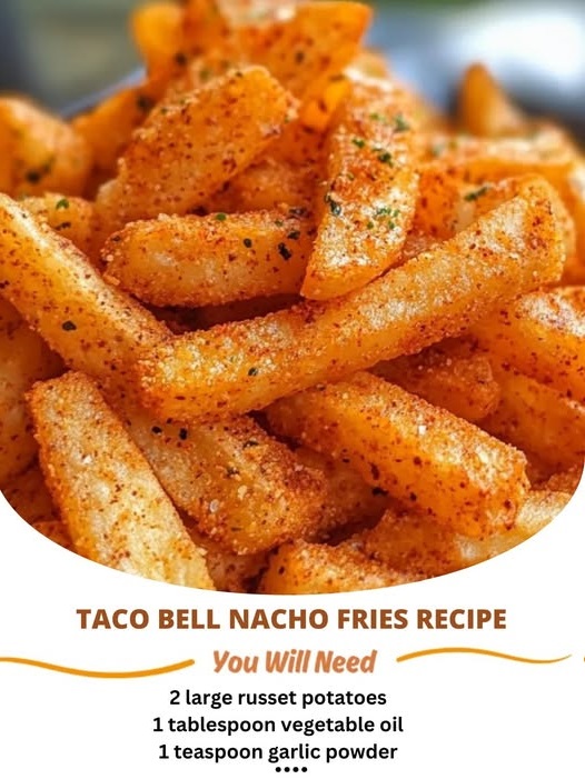 plate of Taco Bell Nacho Fries, golden and crispy, served with a side of warm nacho cheese dipping sauce.